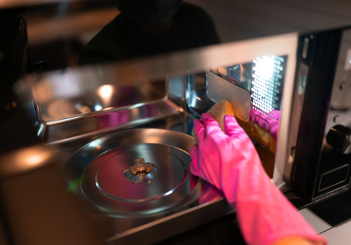 Maintenance Pro blog - image of cleaning microwave