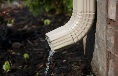 Guide to Effortless Spring Cleaning - Checking the downspout